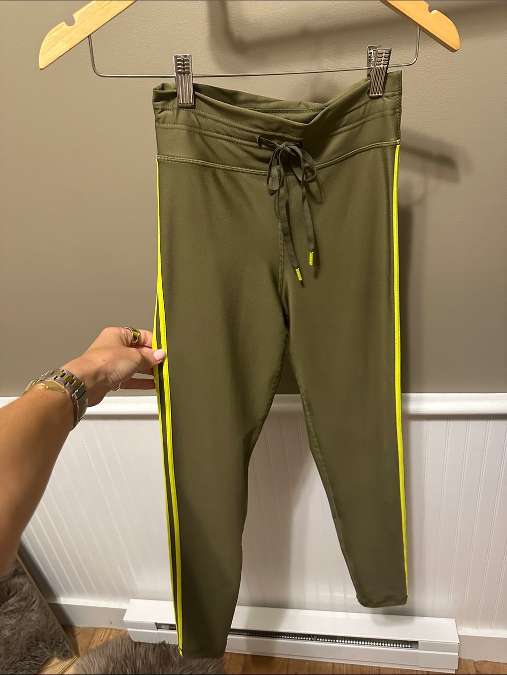 the upside women’s  Olive Green Active Leggings with Neon Side Stripe